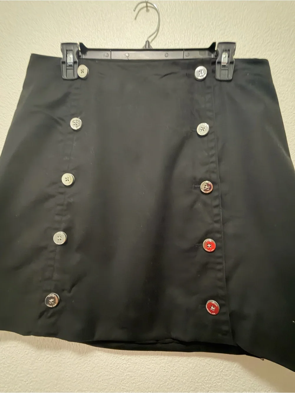 Michael Kors black lined mini skirt with double row silver buttons